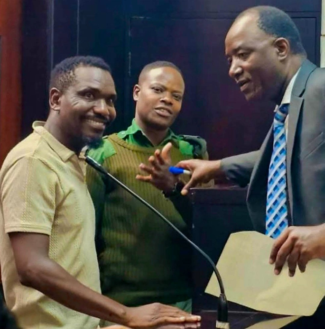 ZIMBABWE JAILS JOURNALISTS, THEN CALLS IT JUSTICE